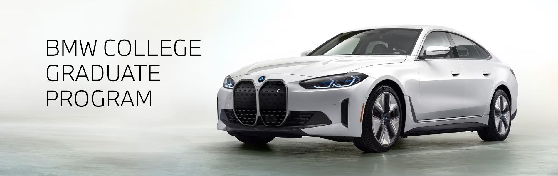 White BMW i4 parked. BMW College Graduate Program. | BMW Showcase 3 in Derwood MD