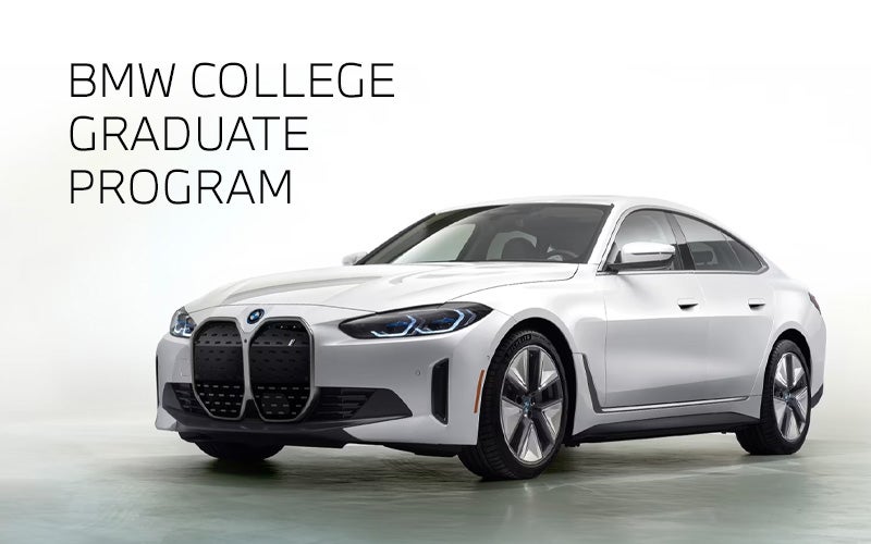 White BMW i4 parked. BMW College Graduate Program. | BMW Showcase 3 in Derwood MD